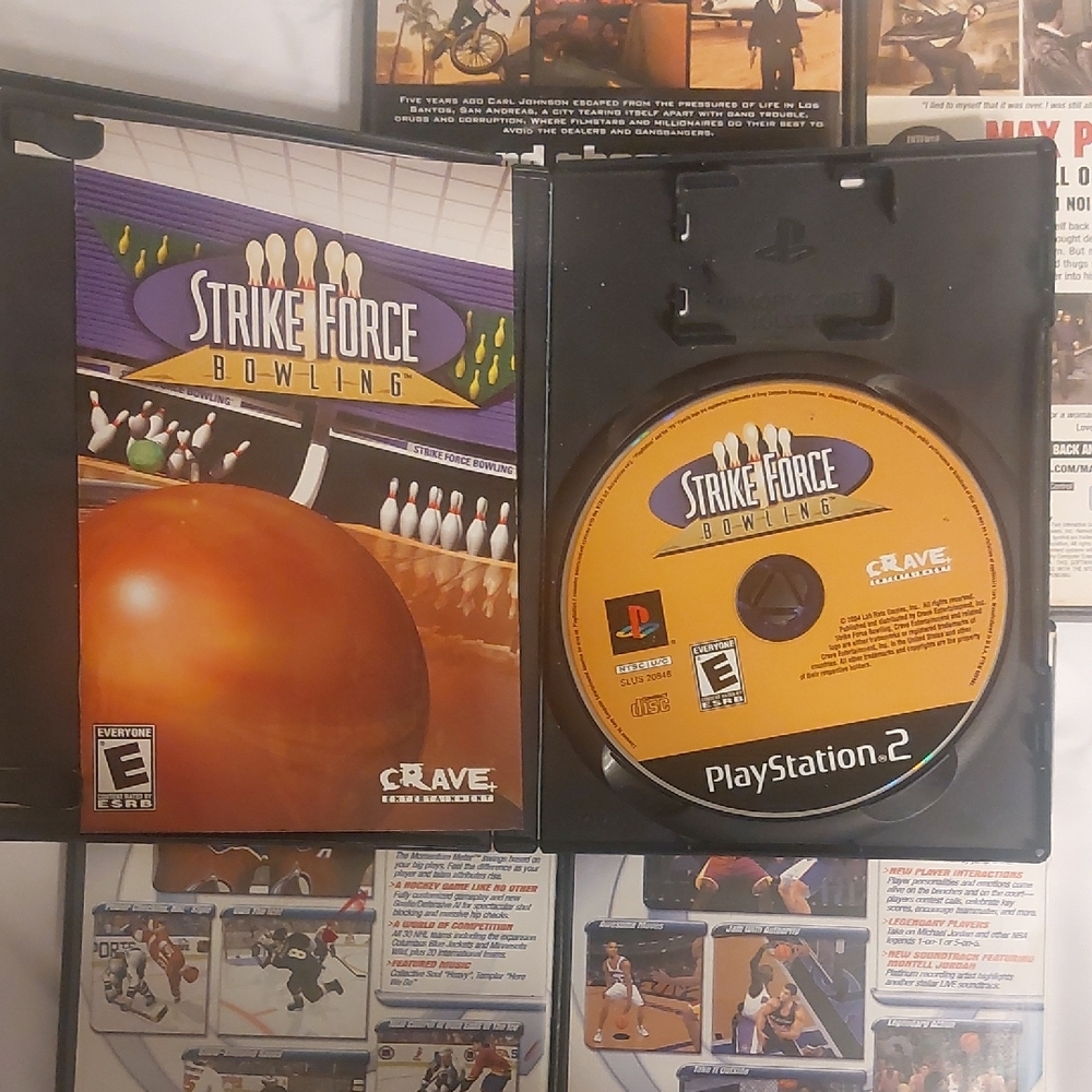 Sony PlayStation 2 Game Collection - Black, Orange, White - Picture 3 of 7